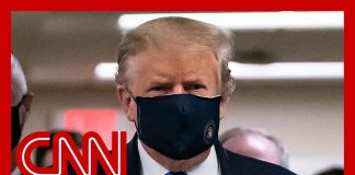 Посещая раненых военных, Трамп впервые надел медицинскую маску